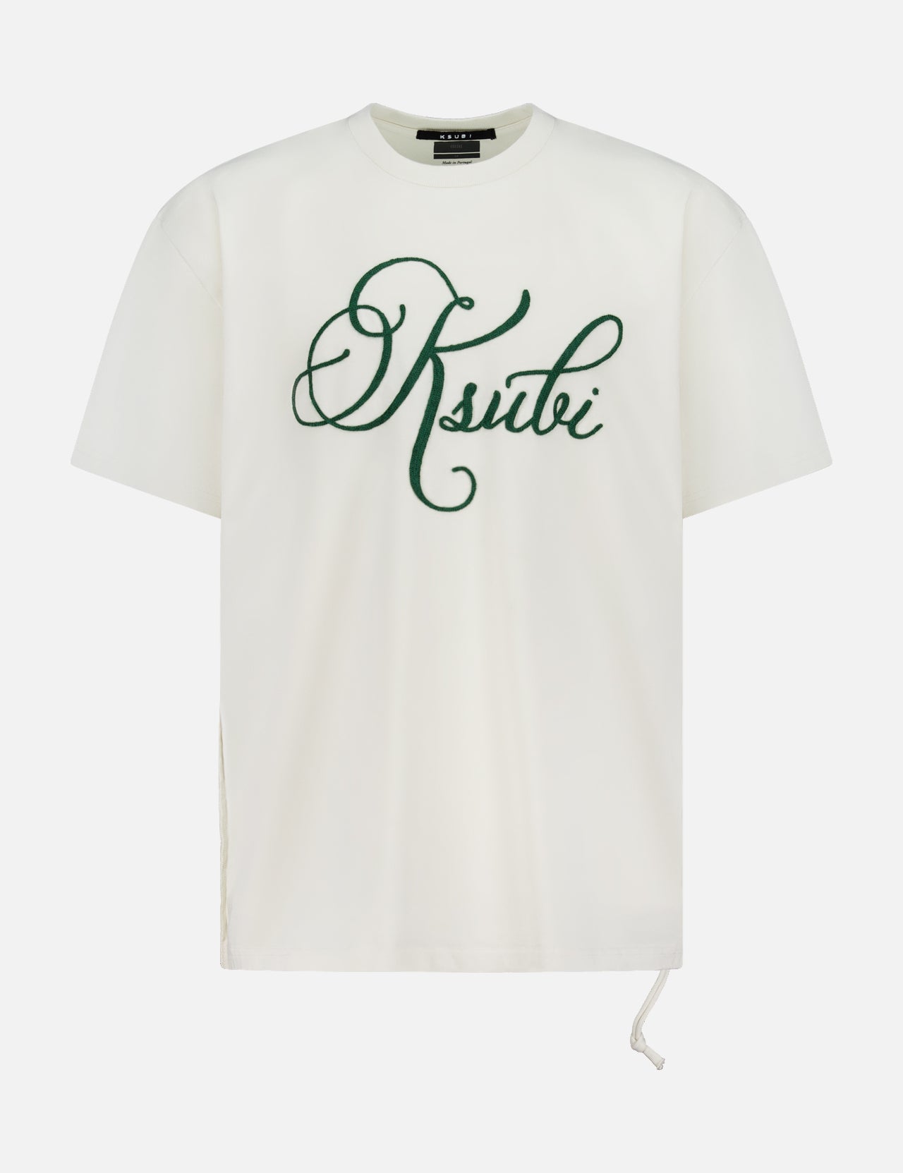 The KSUBI Prestige Biggie Short Sleeve T-shirt in antique white is made from premium cotton jersey and features large green cursive "Ksubi" lettering on the chest with a drawstring detail at the lower right side.