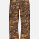 The KSUBI Troop Camouflage Cargo Pant, made from durable cotton twill, features side pockets, a button and zip closure, and adjustable waist tabs, and is displayed on a plain white background.