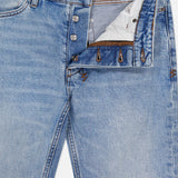 The KSUBI Van Winkle Duke 4Eva Jeans are crafted from comfort stretch denim for an easy fit, featuring light blue faded and distressed detailing throughout. These skinny jeans have a partially open button fly that reveals white pocket lining, while large white KSUBI embroidery stands out near the left front pocket.