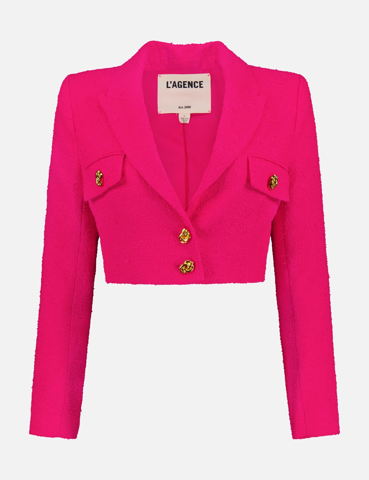 The Maura Cropped Tweed Knot Buttons Jacket by L'AGENCE features bright pink tweed, long sleeves, gold knot buttons, two flap chest pockets, and notched lapels—a bold statement piece against a white background.