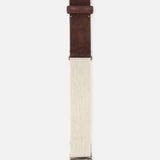 The LA BOUCLE Antibes Hybrid Smart Belt features a beige stretch strap, brown leather detail by the silver buckle, and an engraved silver keeper. Displayed vertically on a white background, it is available in a one-size-fits-all design.