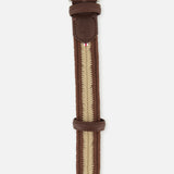 The LA BOUCLE Canterbury Chevron Club Belt is a brown and beige stretch belt with leather accents by the silver buckle and a small stitched logo on the leather.