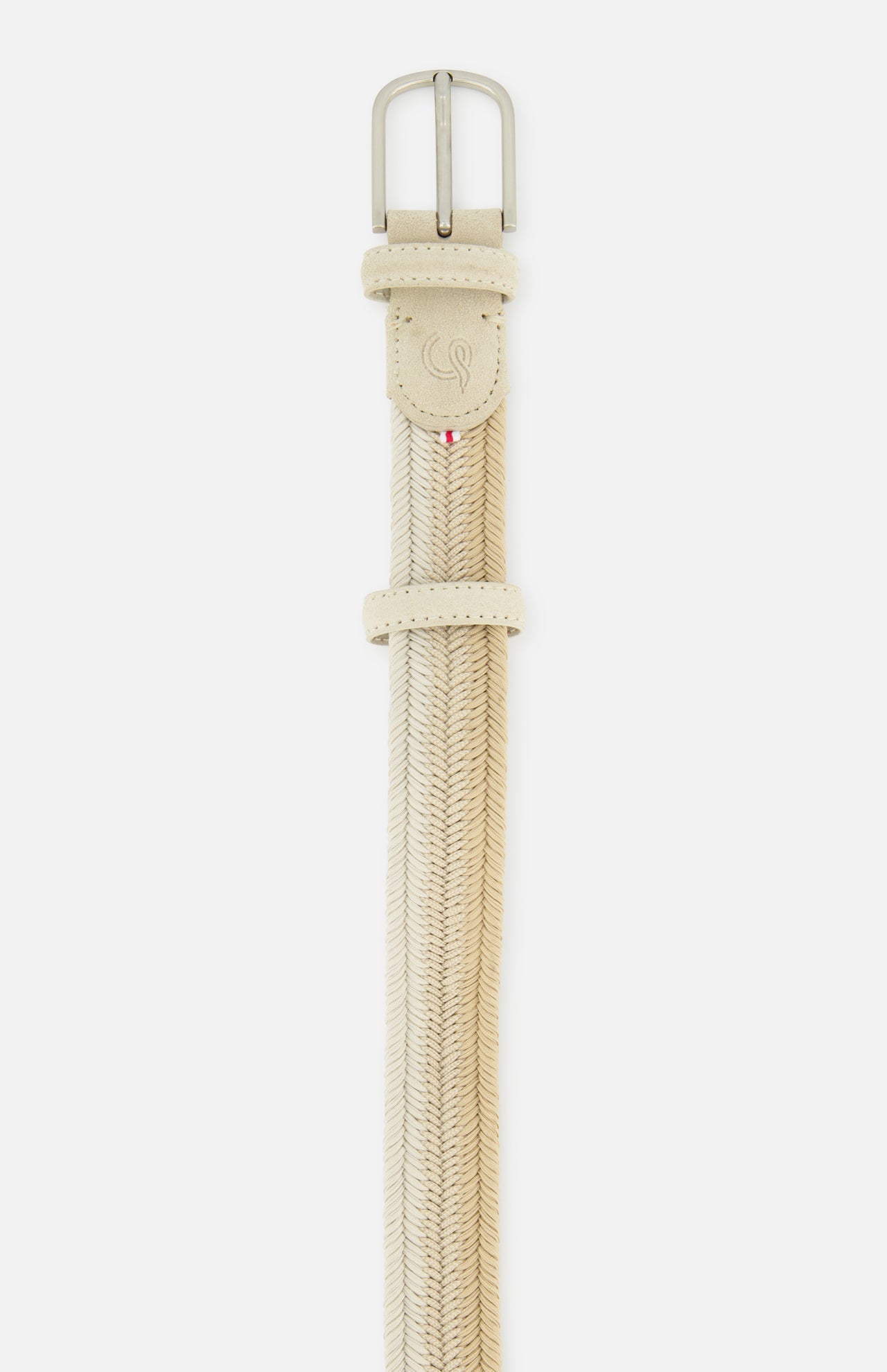 The Nice Chevron Sunset Belt by LA BOUCLE features a beige woven stretch design with leather-trimmed ends and a silver buckle, shown vertically against a white background.