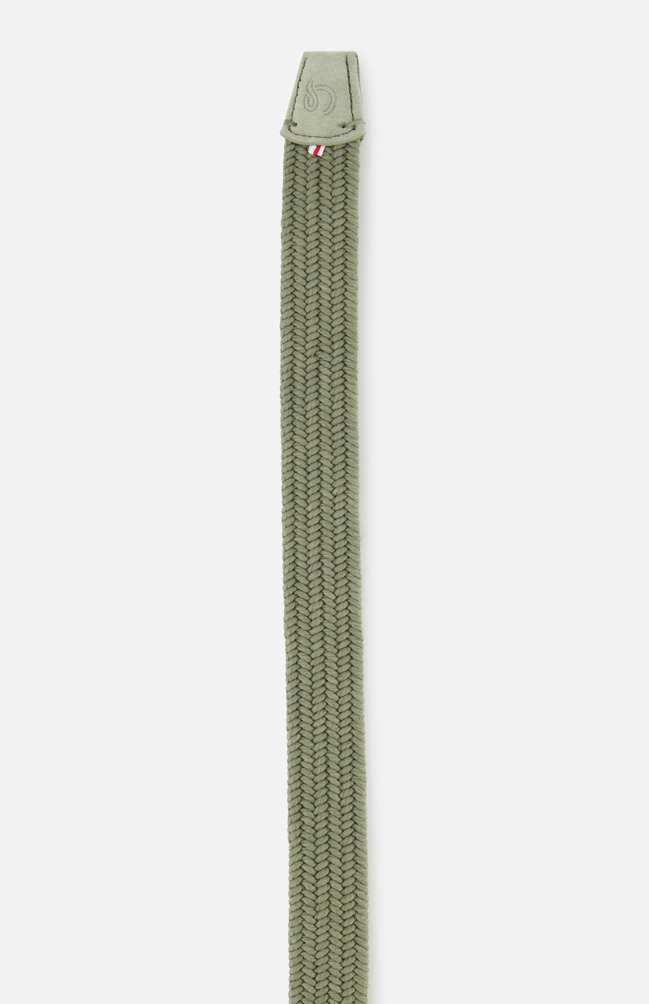 The Veneto Suede Waxed Cotton Belt by LA BOUCLE features an olive green stretch weave with a stitched triangular suede tip and a small red and white tag underneath.