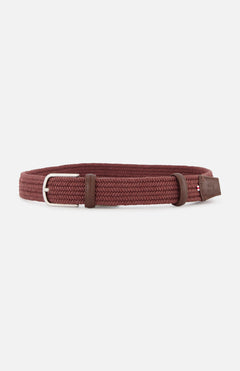 The LA BOUCLE Sardegna Waxed Cotton Belt features a braided brown stretch design, silver buckle, leather accents, and zero-hole style, displayed on a white background.