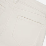 Close-up of the back of L'AGENCE Ruth High Rise Straight Jean in off-white premium stretch denim, highlighting a belt loop, back yoke, and single back pocket against a plain background.