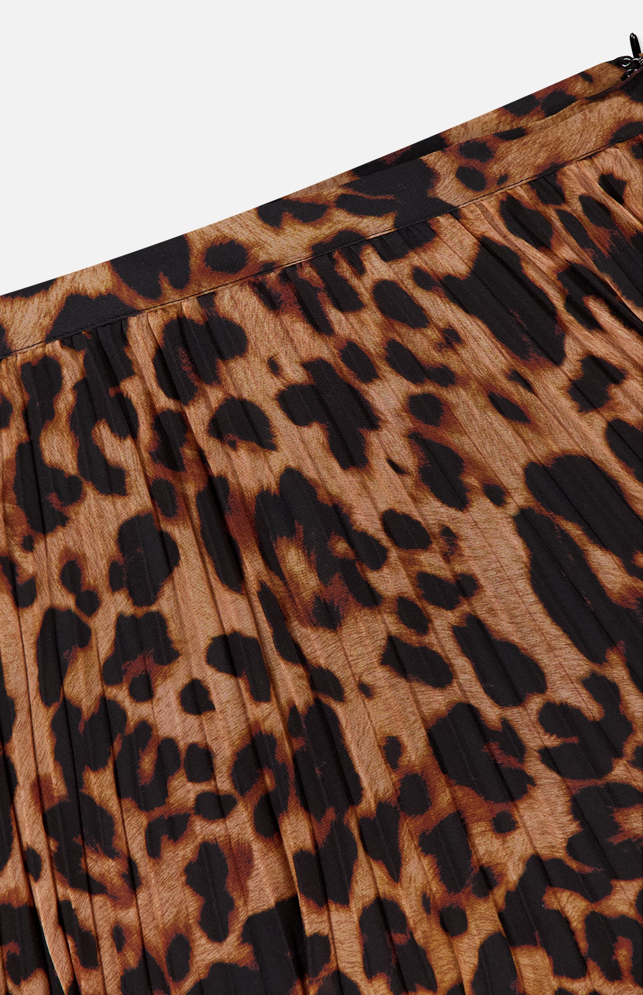 A close-up of the L'AGENCE Torin Pleated Maxi Skirt, highlighting its flowing silhouette, elegant movement, and refined pleated details.