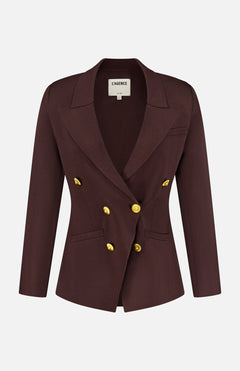 The Amelia Knit Blazer by L’AGENCE is a dark brown, double-breasted blazer with peaked lapels and six shiny gold buttons. This fitted knit design features long sleeves and is shown against a plain white background.