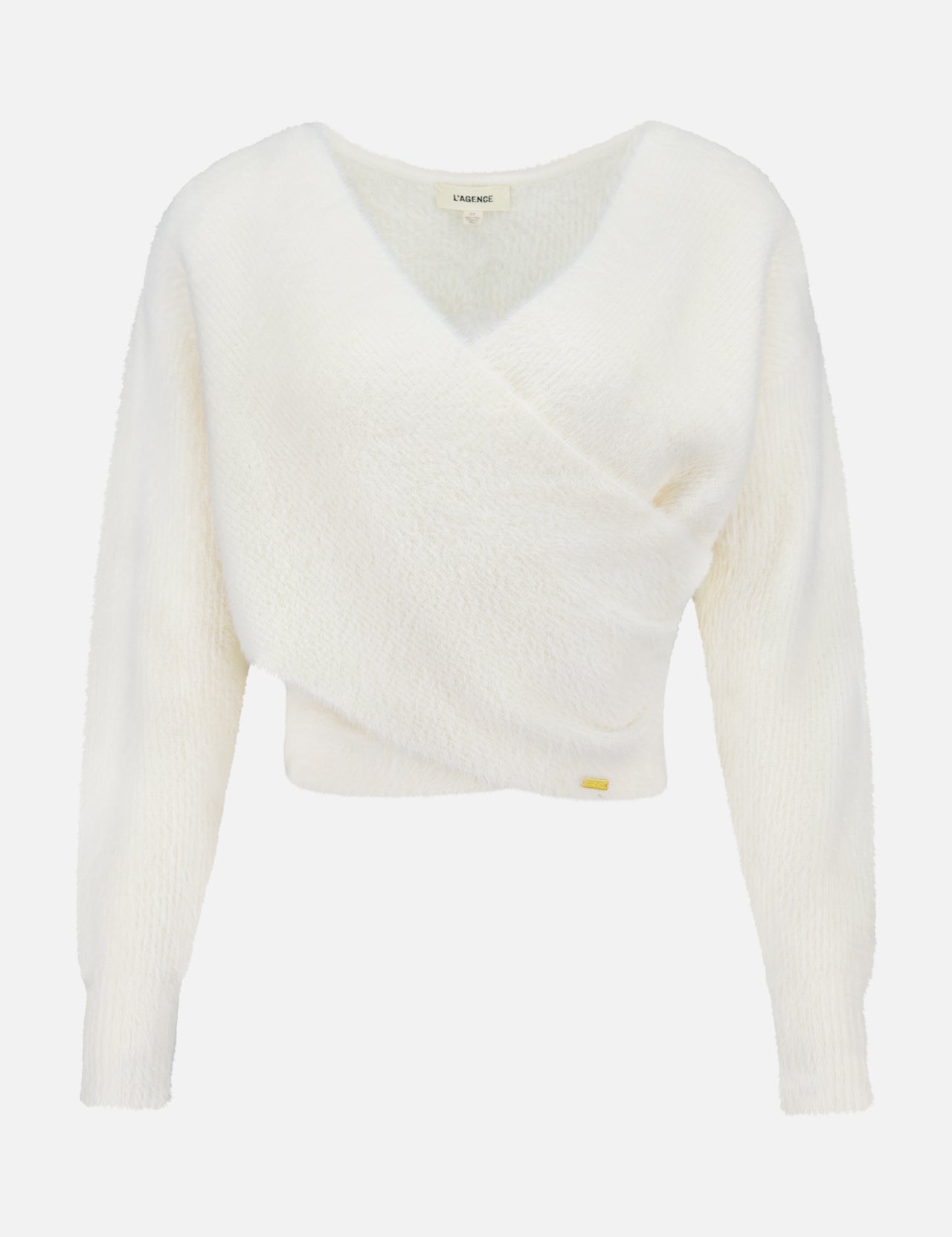 The Antonella Surplus Pullover Sweater by L'AGENCE is an ivory, cropped knit with a soft, fluffy texture. It features a white long-sleeve V-neck wrap design and is displayed on a plain background.