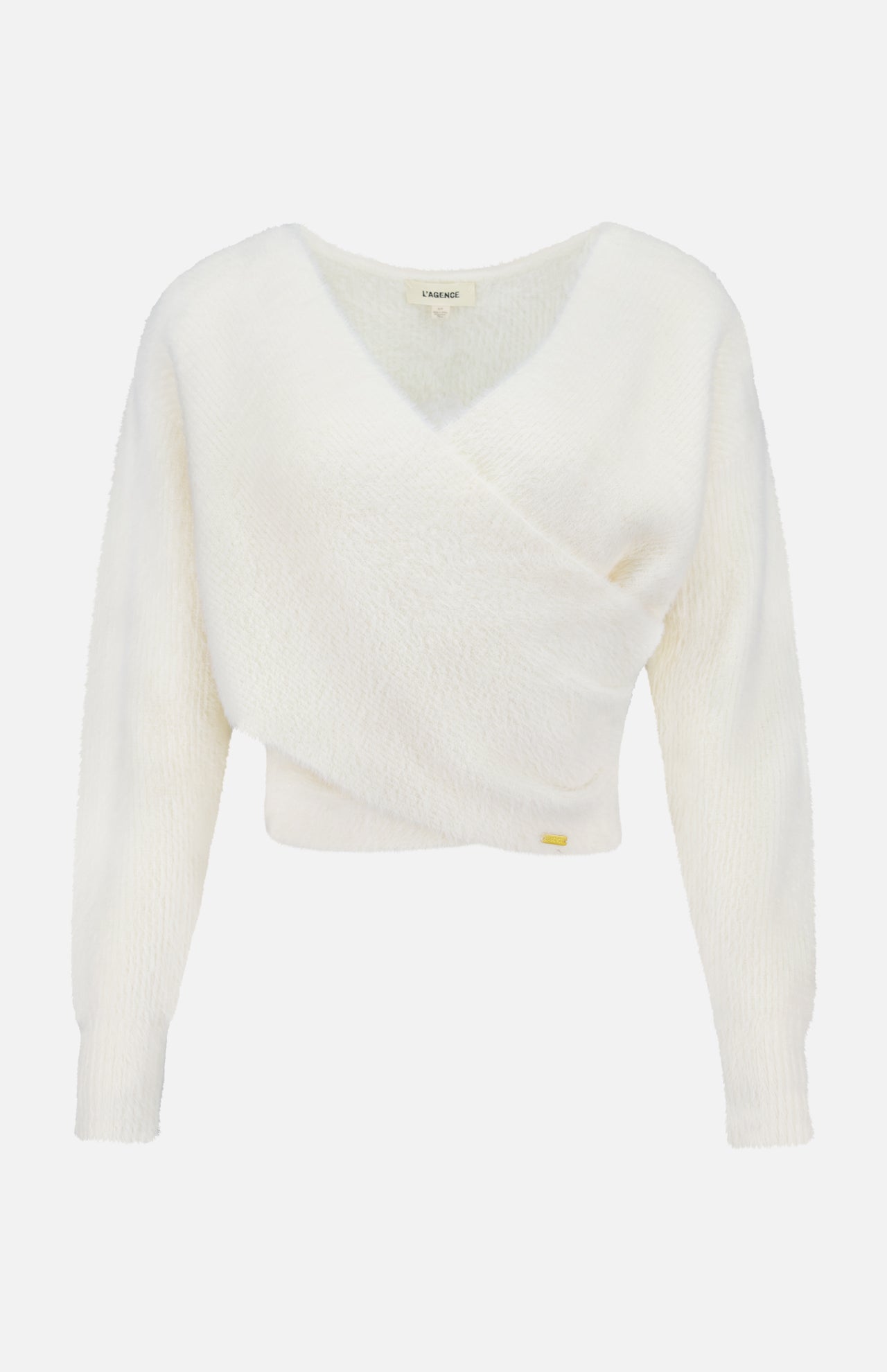 The Antonella Surplus Pullover Sweater by L'AGENCE is an ivory, cropped knit with a soft, fluffy texture. It features a white long-sleeve V-neck wrap design and is displayed on a plain background.