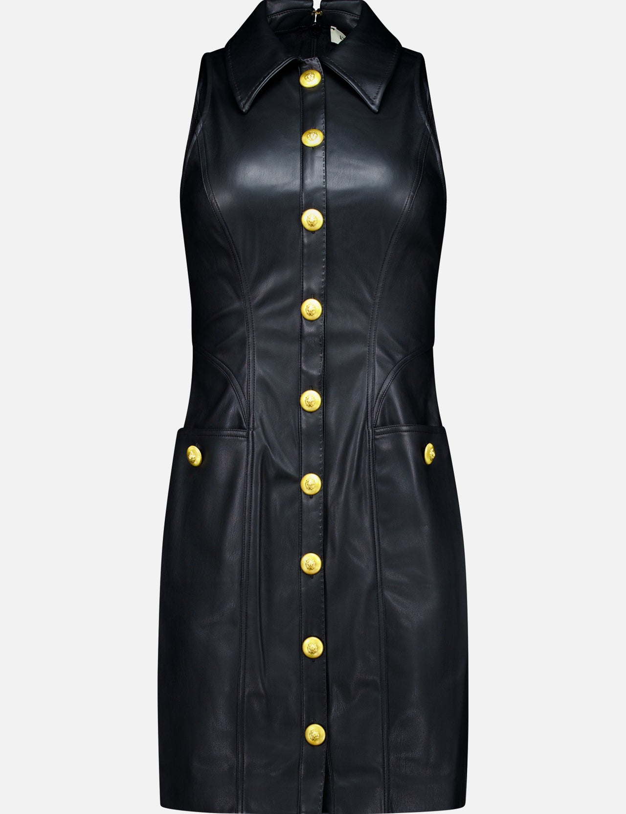The Apolline Collar Racer Mini Dress by L’AGENCE is a sleeveless black vegan leather mini dress with a collared neckline and front gold button closure, featuring two pockets adorned with matching gold buttons. The dress is displayed on a plain white background.