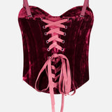 L’Agence Ariana Lace Up Corset Top in deep red velvet, featuring a front lace-up closure with pink ribbons and adjustable spaghetti straps.