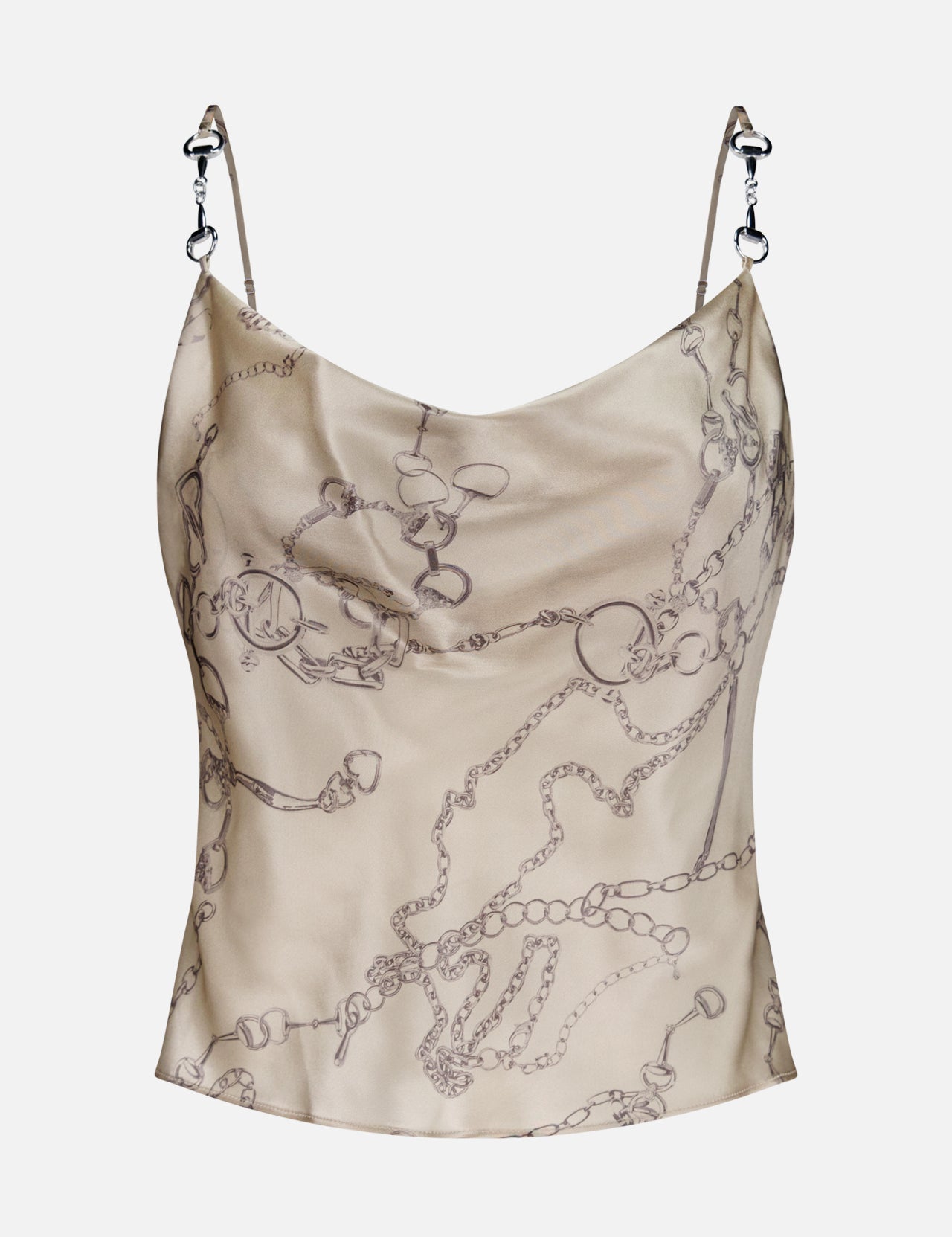 The Calista Horsebit Trim Cowl Cami by L'AGENCE is a beige silk camisole with thin chain-link straps and a subtle horsebit-inspired print, featuring intertwined chains and jewelry motifs across the fabric.