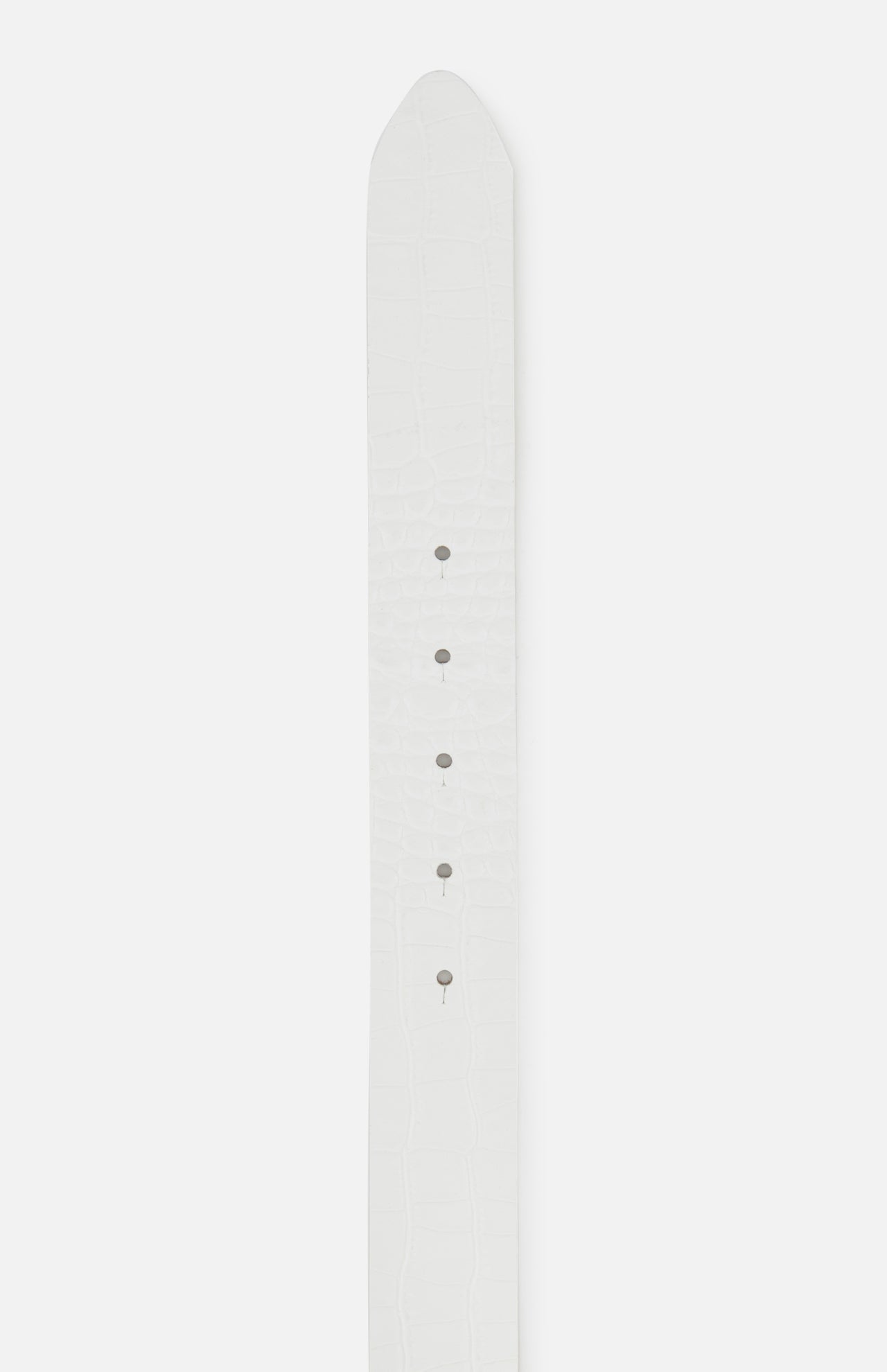 A close-up of the Chara Organic Hammer Belt by L'AGENCE, featuring white croc-embossed leather, a silver buckle, and several evenly spaced holes along the center.