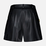 Back view of black faux leather Clairmont Cargo Short featuring side pockets, belt loops, and metallic hardware.