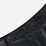 Black faux leather Clairmont Cargo Short featuring a waistband with belt loops.