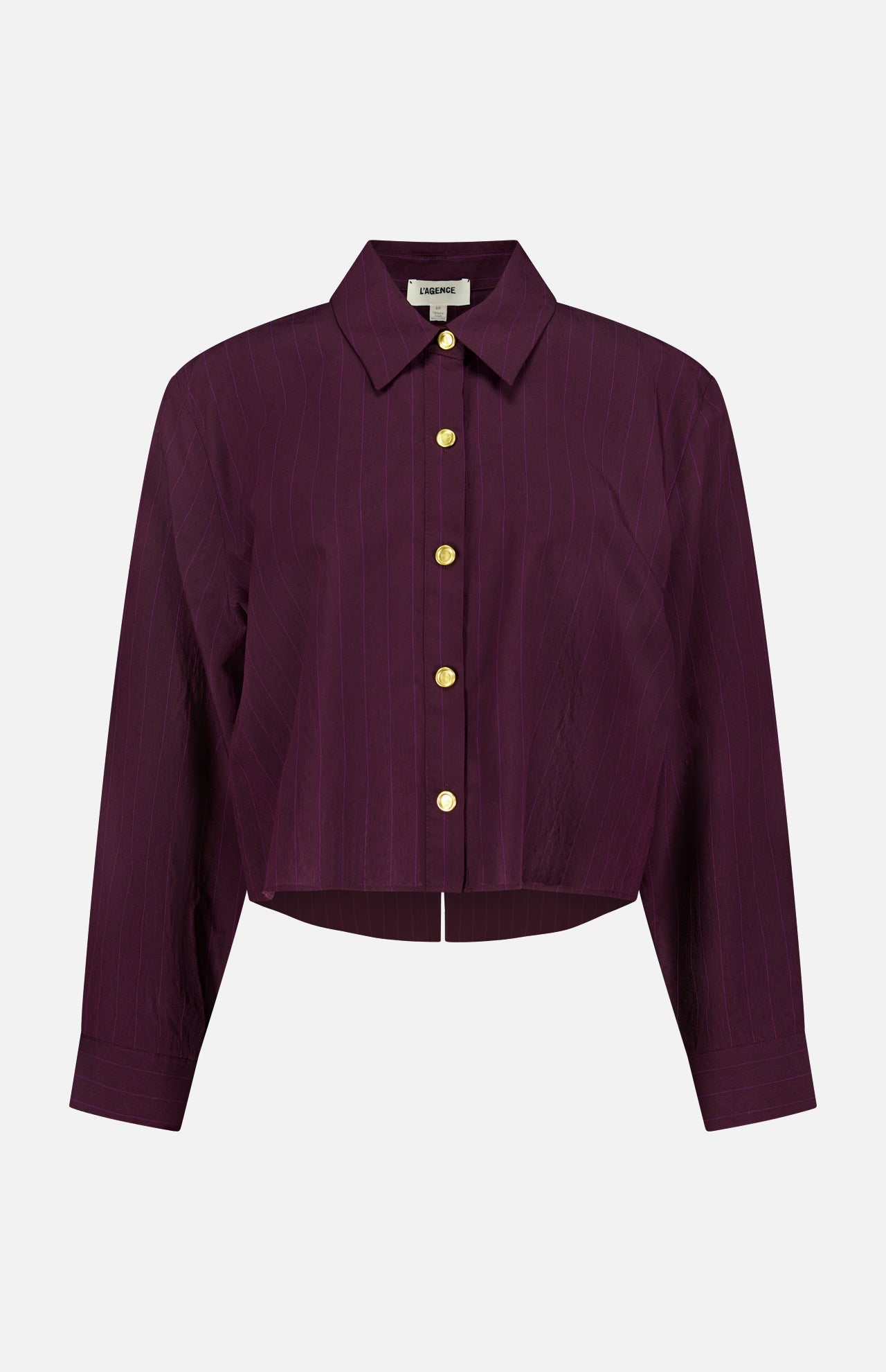 The Cosette Crop Hi Low Shirt by L'AGENCE is a long-sleeve burgundy pinstripe button-up with a pointed collar, gold-tone coin buttons, a slightly cropped high-low hem, and a boxy fit.