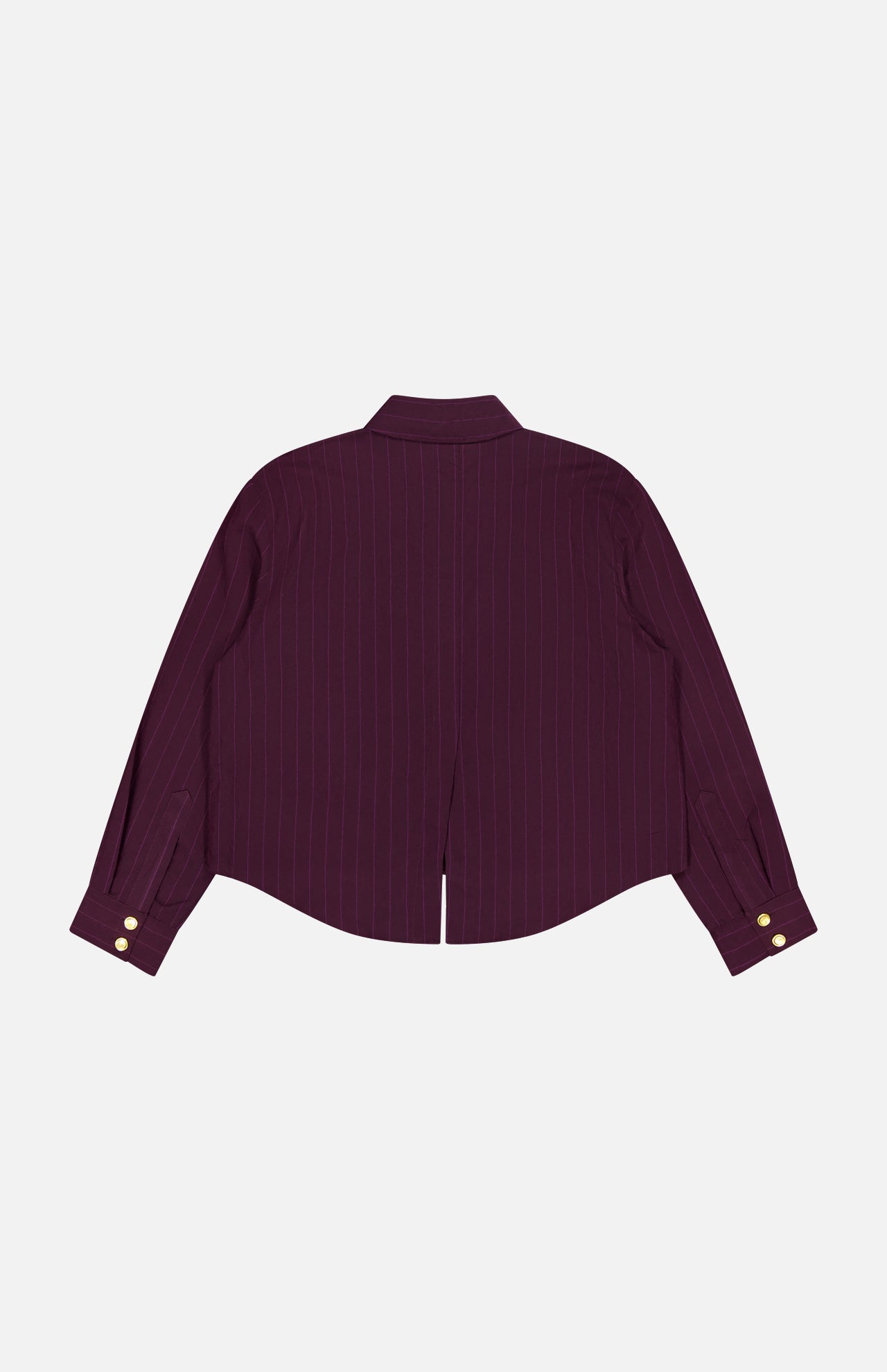 The L'AGENCE Cosette Crop Hi Low Shirt is shown from the back, featuring burgundy pinstripes, a straight collar, gold-tone coin buttons at the cuffs, and a cropped high-low hem with a center slit.
