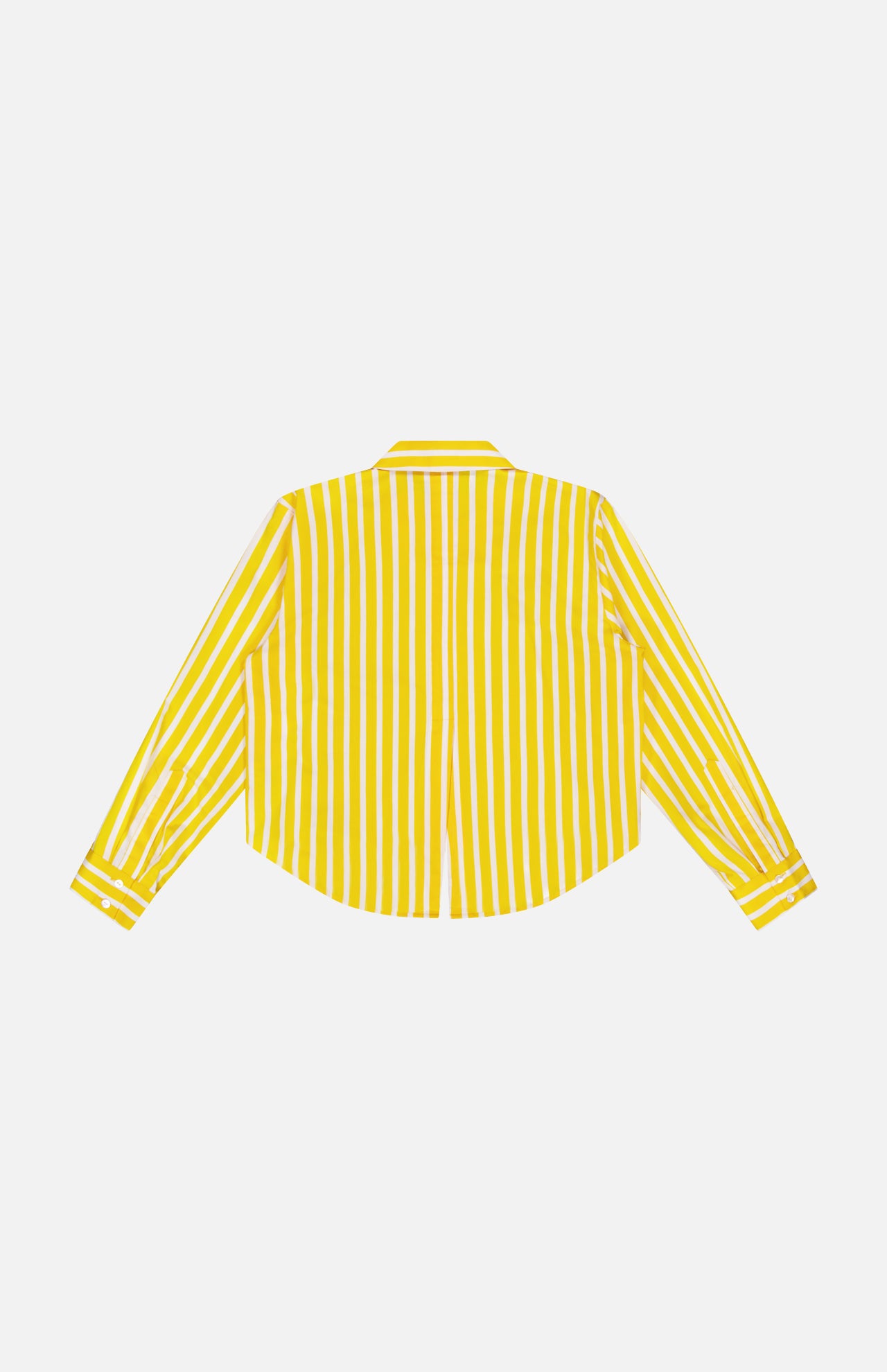 The Cosette Crop Hi Low Shirt by L'AGENCE is shown from the back, featuring vertical yellow and white stripes, buttoned cuffs, and a straight collar. Made from organic cotton, this cropped shirt stands out against a plain white background.