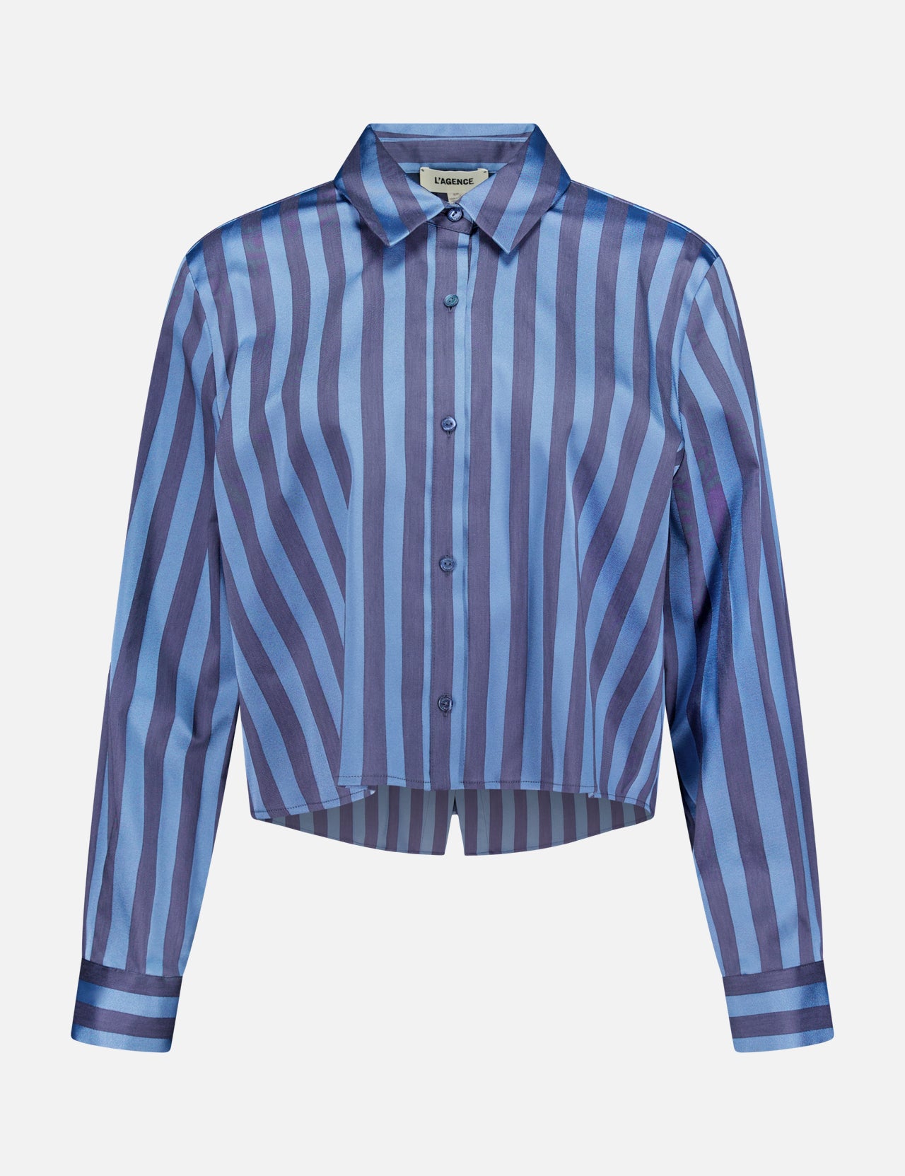 The Cosette Cropped Hi Low Shirt by L'AGENCE features long sleeves, a pointed collar, a slightly cropped hem, and vertical and diagonal blue and purple stripes.