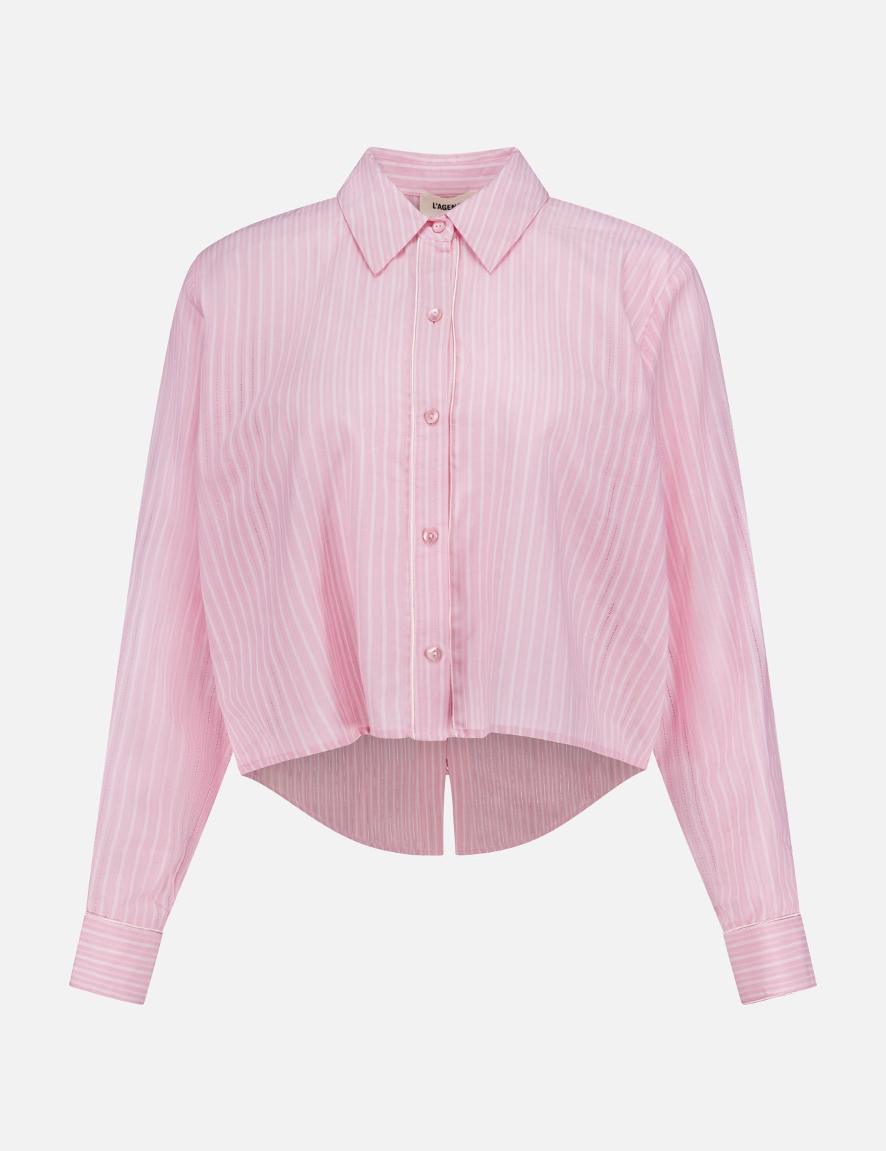 The Cosette Cropped Back Slit Shirt by L'AGENCE is a light pink cotton long-sleeve shirt with white vertical stripes, a pointed collar, and a cropped hem. Displayed on a plain white background.