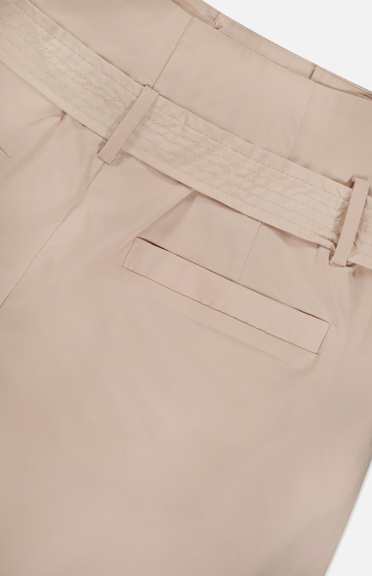 Close-up of the back of the L'AGENCE Damira Paperbag Short in beige, featuring a self-tie belt, belt loop, and single welt pocket.