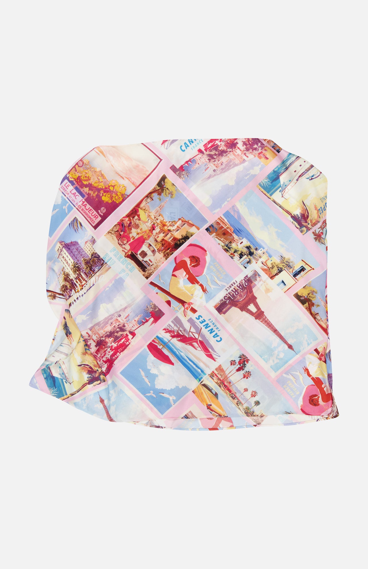 The Driselle Scarf Top by L’AGENCE showcases a pink design with a diagonal grid of vintage-style travel postcards and illustrations—women in hats, beaches, landmarks, and scenic views—making it an ideal summer vacation piece.