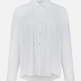 The L'AGENCE Ellery Long Sleeve Sheer Blouse is a versatile women's top in white ramie with a pointed collar, straight cuffs, and relaxed fit, showcased on a white background.