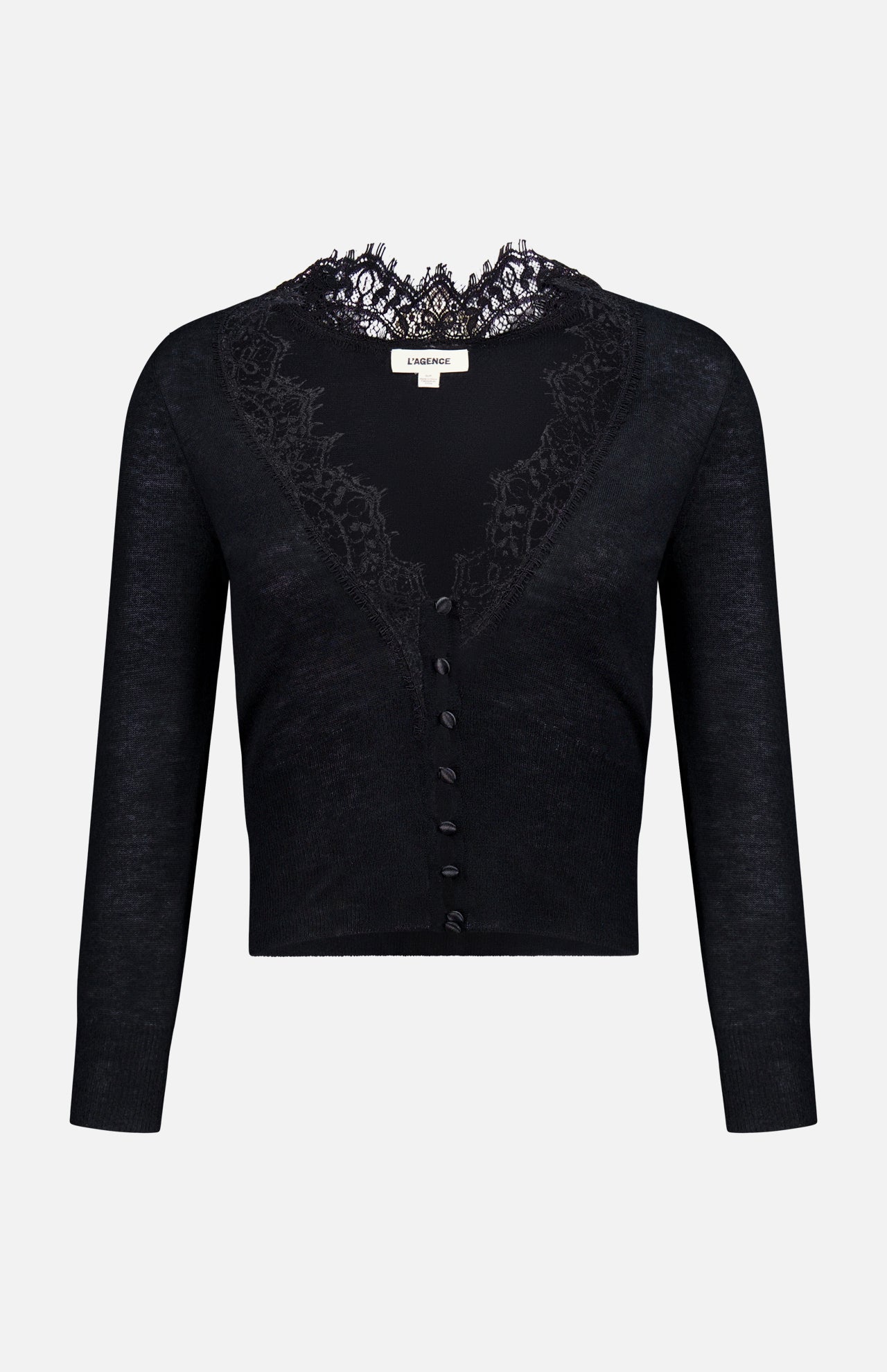 The Eluna Lace Detail Cardigan by L’AGENCE is a black long-sleeve sweater featuring elegant lace accents around the deep V-neckline and matching black buttons down the front. This lightweight transitional piece is showcased against a plain white background.