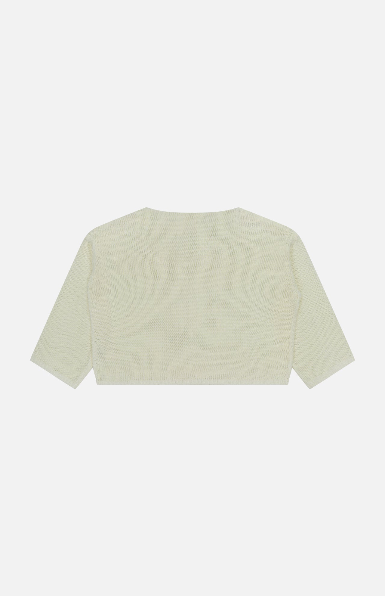 The L'AGENCE Ethan Knit Pullover Sweater is a light beige, cropped, long-sleeve relaxed fit style displayed flat on a white background from the back.