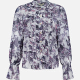 The Eunice Ruffle Sleeve Blouse by L'AGENCE features a sheer chiffon fabric with a purple and black floral print, ruffled front, and flared ruffle cuffs—a lightweight, feminine style perfect for any occasion.