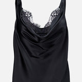 The Evadne Cowl Neck Tank Top by L’AGENCE features a graceful cowl neckline and delicate black lace trim at the bust, crafted in sleek black satin for a timeless and elegant look reminiscent of a classic lace tank top. Shown against a plain white background.