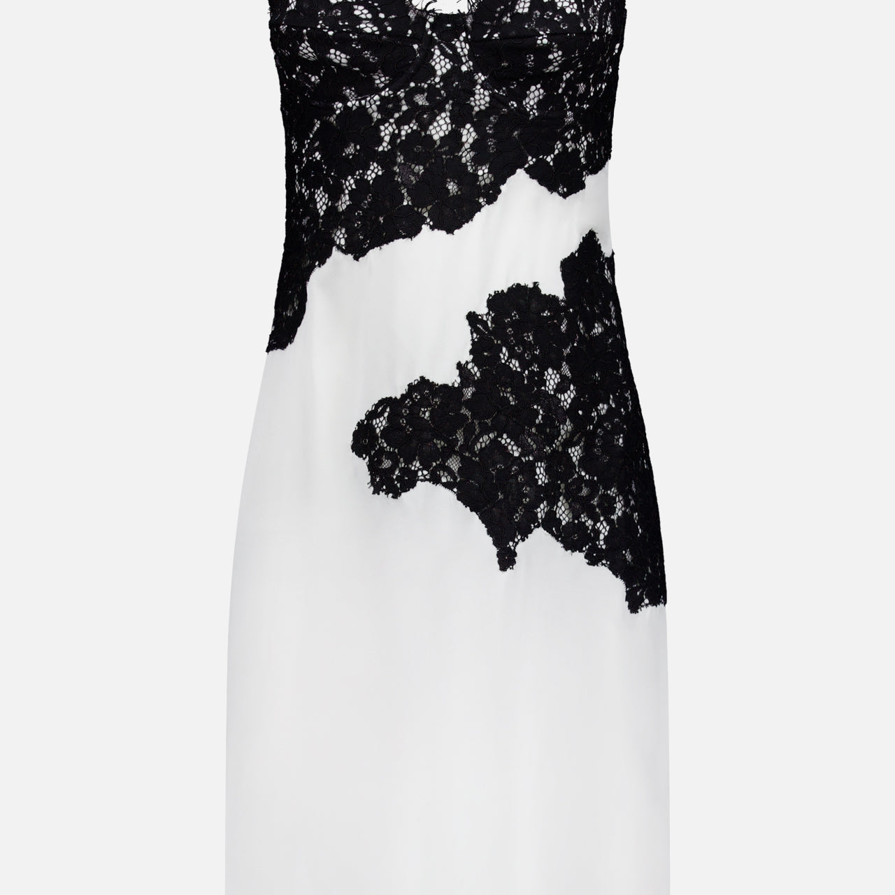 The Fenna Lace Applique Dress by L'AGENCE is a sleeveless ivory silk dress with black lace detailing on the bustier, midsection, and lower right side. It features thin straps and a fitted silhouette.