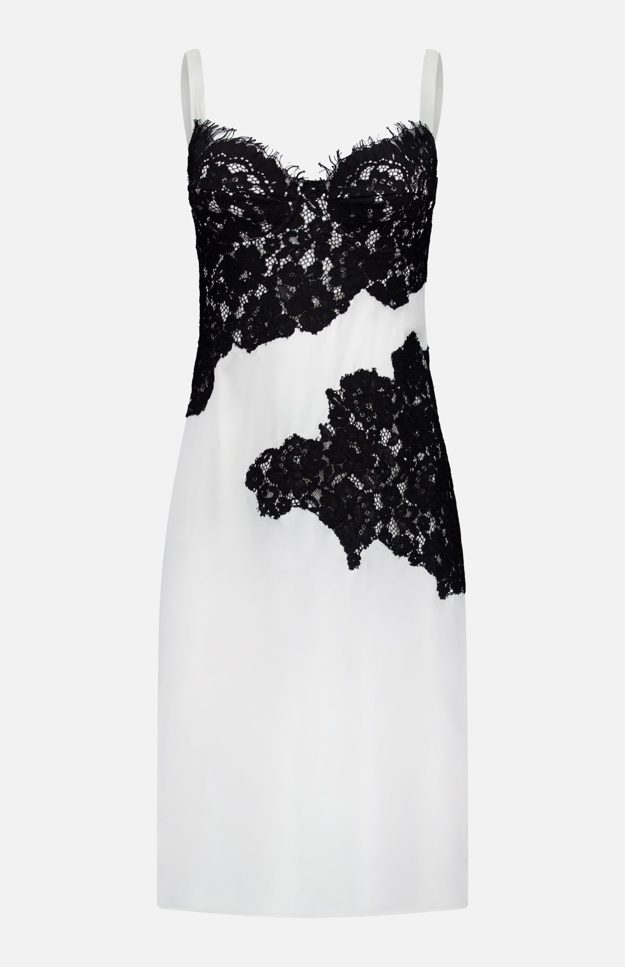 The Fenna Lace Applique Dress by L'AGENCE is a sleeveless ivory silk dress with black lace detailing on the bustier, midsection, and lower right side. It features thin straps and a fitted silhouette.