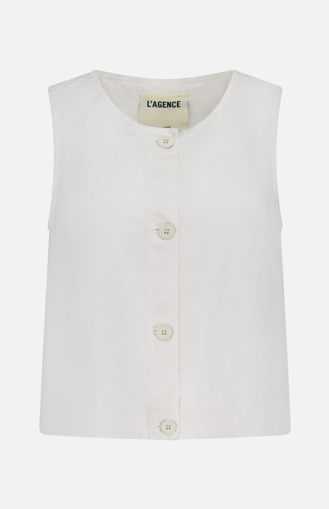 The Foster Sleeveless A-Line Top by L’AGENCE is a white linen tank with a round neckline, button-front detail with four front buttons, and features a visible L’AGENCE label inside the collar.