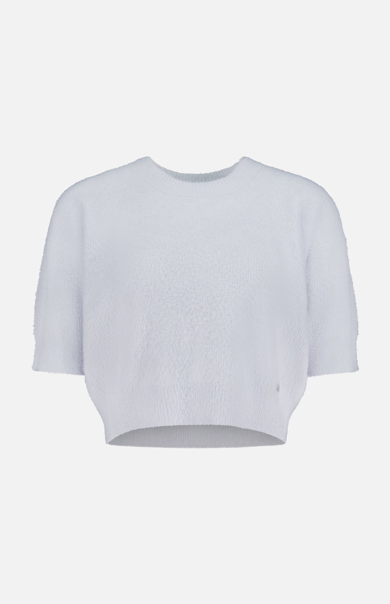 The L'AGENCE Guinevere Short Sleeve Cropped Crewneck Shirt features a pale blue hue, short sleeves, a crew neck, and a relaxed fit, shown against a white background.