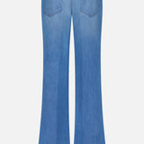 Back view of L'AGENCE Joanne Low Rise Wide Leg Jean in Pacific, featuring light blue vintage denim, flared legs, and two back pockets, displayed against a plain white background.