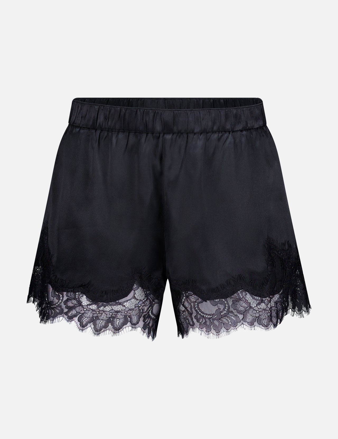 The Joy Lace Pull On Short by L'AGENCE features an elastic waistband and delicate lace trim at the hem, crafted in smooth satin and shown against a plain white background.