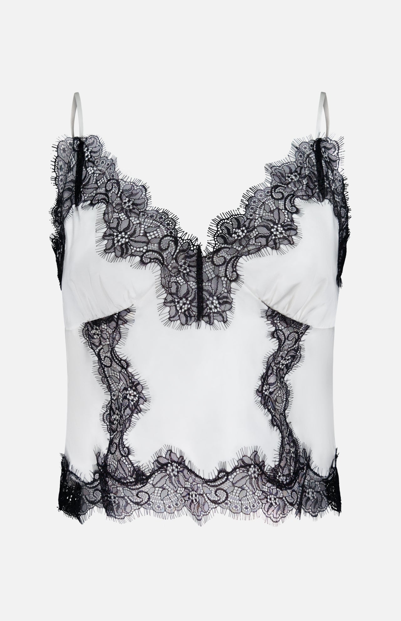 The Kimber Lace Insert Cami by L'AGENCE is a white satin cropped camisole featuring black lace trim at the neckline, hem, and seams, plus thin adjustable straps for a delicate, sophisticated look.