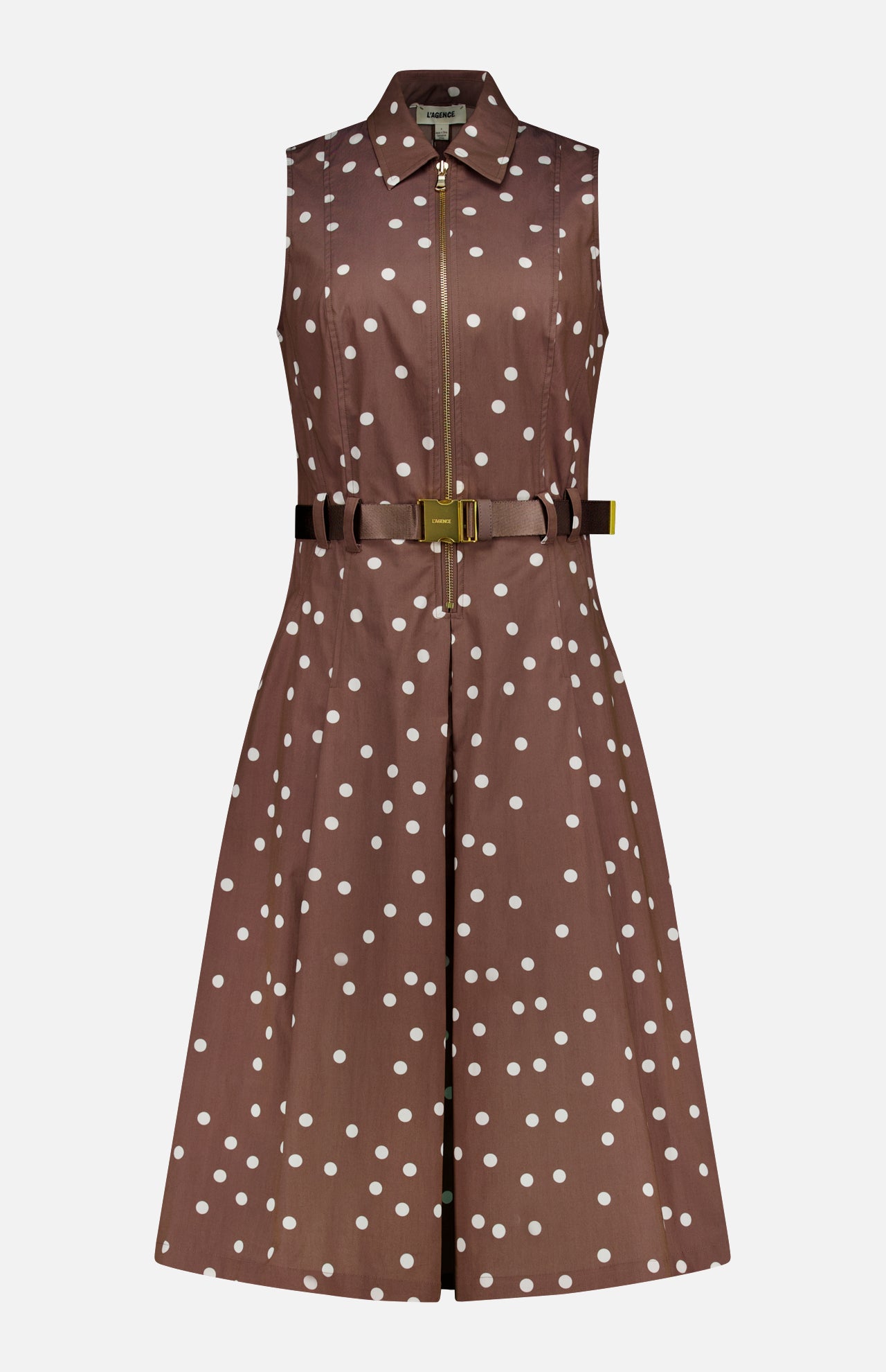 The Kylo Belted Shirt Dress by L'AGENCE features a sleeveless design, light brown color with polka dots, collared neckline, front zipper, fitted waist with matching belt, and a flared knee-length skirt.