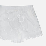 The L'AGENCE Laina Pull On Eyelet Short features a floral pattern, elastic waistband, cotton lining, and comfortable pull-on style, displayed against a plain light background.