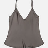Lexi Silk Charmeuse Camisole by L’AGENCE features a gray silk finish, adjustable straps, V-neckline, and slightly flared hem, shown laid flat on a white background.