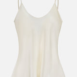 The Lexi Silk Camisole by L'AGENCE features a cream hue, thin adjustable straps, and a subtly flared hem, shown against a plain white background.