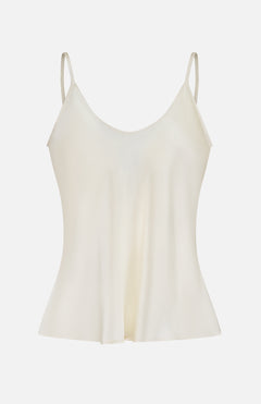 The Lexi Silk Camisole by L'AGENCE features a cream hue, thin adjustable straps, and a subtly flared hem, shown against a plain white background.