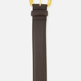 L’Agence Marcaeu Baroque Belt in chocolate brown leather featuring a gold-tone statement buckle with an ornate, embossed scrollwork design.