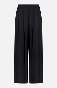 The Novalynn Cropped Pleated Pant by L'AGENCE features a wide-leg silhouette, high rise, and front pleats, shown here in black against a plain white background.