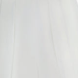 Close-up of the Novalynn Cropped Pleated Pant by L'AGENCE, featuring a white high-rise design with subtle vertical seams, showcasing the waistband and upper section of its wide-leg silhouette.