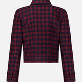 Back view of the L’Agence NYX Cropped Tweed Jacket in a dark red and navy blue plaid pattern.