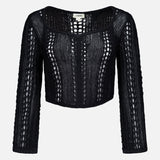 The Orine Cropped Pointelle Knit Top by L'AGENCE is a black long-sleeve crop top with a scoop neckline, showcasing vertical open-knit patterns, delicate pointelle knit detailing, and a slightly loose fit.