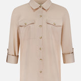 The L'AGENCE Pearson Military Pocket Blouse features a beige poplin fabric, collared neckline, two front chest pockets, and long sleeves rolled to three-quarter length, displayed on a white background.